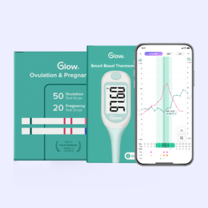 Glow’s ovulation and pregnancy test strips, basal temperature thermometer, and app screen in a phone tracking basal temperature